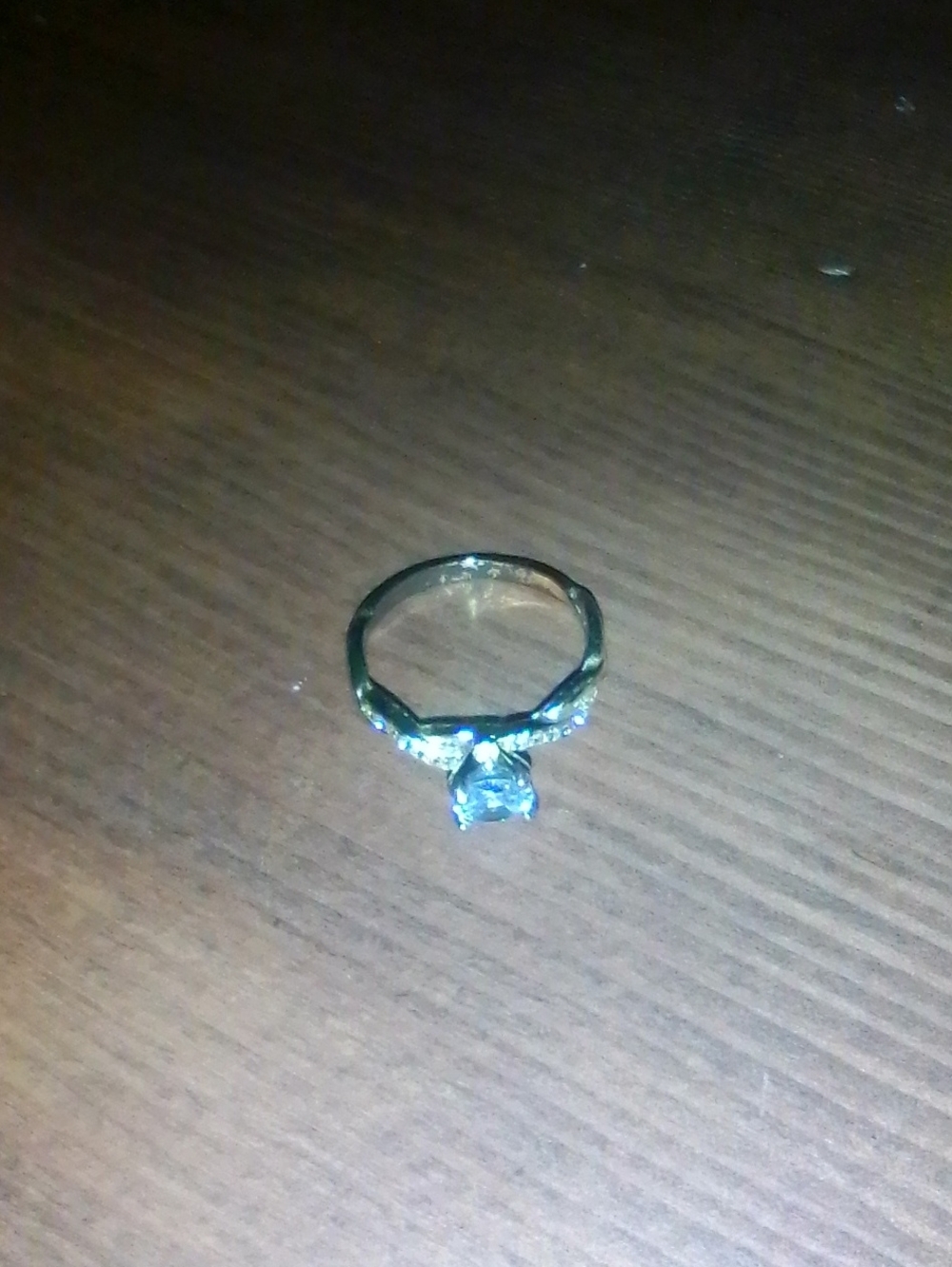 Gold Solitaire Engagement Ring with Clear Stone